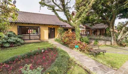Casa em condomínio fechado com 5 quartos à venda na Avenida Firmino Octávio Bimbi, 255, Cavalhada, Porto Alegre por R$ 1.800.000