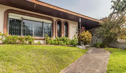 Casa com 4 quartos à venda na Rua Jacipuia, 201, Guarujá, Porto Alegre por R$ 1.450.000