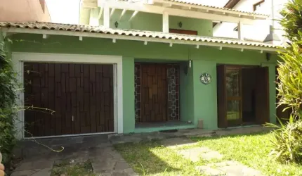 Casa com 3 quartos à venda na Rua Doutor Benjamin Camozato, 55, Jardim Isabel, Porto Alegre por R$ 1.300.000