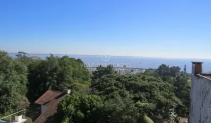 Casa com 3 quartos à venda na Rua Bororó, 225, Vila Assunção, Porto Alegre por R$ 1.950.000