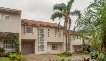 Casa em condomínio fechado com 4 quartos à venda na Rua Conrado Ferrari, 71, Jardim Isabel, Porto Alegre por R$ 950.000