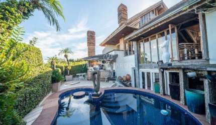 Casa com 4 quartos à venda na Rua Edgar Luiz Schneider, 15, Jardim Isabel, Porto Alegre por R$ 1.500.000