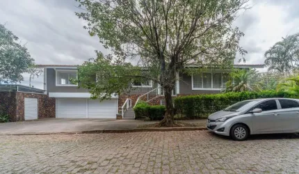 Casa com 3 quartos à venda na Rua Morano Calabro, 570, Jardim Isabel, Porto Alegre por R$ 1.600.000