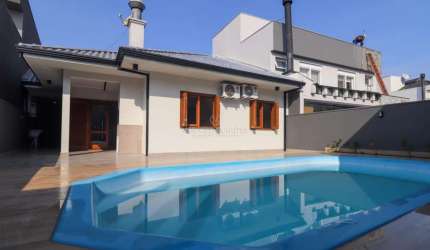 Casa em condomínio fechado com 3 quartos à venda na Rua Francisco Solano Borges, 200, Hípica, Porto Alegre por R$ 899.000