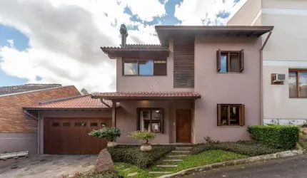 Casa em condomínio fechado com 4 quartos à venda na Avenida Vicente Monteggia, 2000, Cavalhada, Porto Alegre por R$ 1.330.000