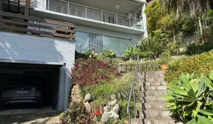 Casa com 3 quartos à venda na Rua Edgar Luiz Schneider, 480, Jardim Isabel, Porto Alegre por R$ 1.250.000