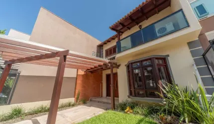 Casa com 3 quartos à venda na Rua Roberto Santini, 194, Hípica, Porto Alegre por R$ 650.000