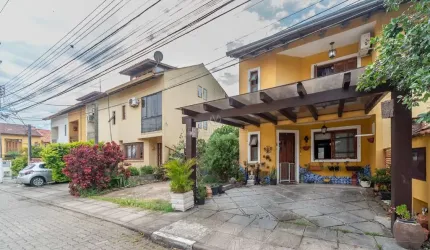 Casa em condomínio fechado com 2 quartos à venda na Avenida Edgar Pires de Castro, 1286, Hípica, Porto Alegre por R$ 600.000