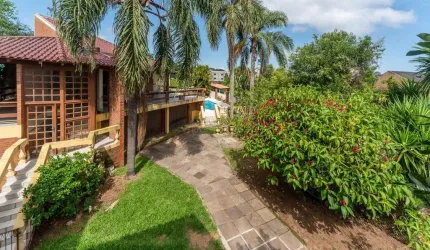 Casa com 3 quartos à venda na Rua Doutora Noemi Valle Rocha, 295, Serraria, Porto Alegre por R$ 1.400.000