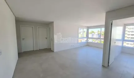Apartamento Central de 02 dormitórios com suíte e 01 vaga de garagem
