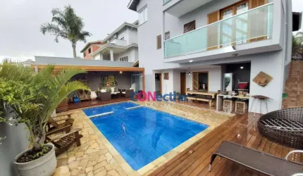 Casa com 4 dormitórios, 250 m² - venda por R$ 1.850.000 ou aluguel por R$ 8.810/mês ( Pacote ) - Condomínio Itatiba Country Club - Itatiba/SP