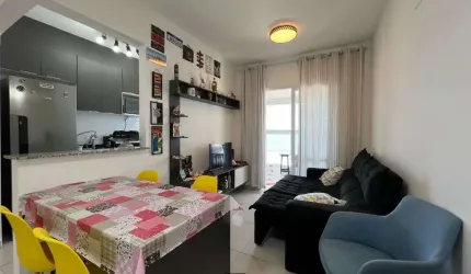 Apartamento de 1 quarto com suíte e vaga de garagem no Caiçara, Praia Grande-SP: seu novo lar espera por você!