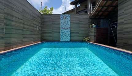 Oportunidade imperdível: Casa à venda em Praia Grande-SP, bairro Flórida, com 3 quartos, 1 suíte, 2 salas, 3 banheiros, 4 vagas de garagem e 374m² de área.