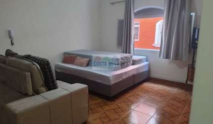 Apartamento a venda na Vila Tupi, a 50 metros da praia. 1 quarto, 1 banheiro, 1 garagem