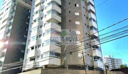 Apartamento de dois dormitórios com sacada gourmet próximo a praia