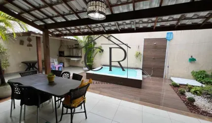 Fantástica casa em condomínio com portaria 24h, com piscina privativa e aquecida!
