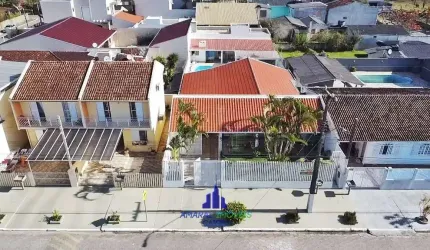 REF: V261 CASA COM PISCINA NO BALNEÁRIO GUARAPARI