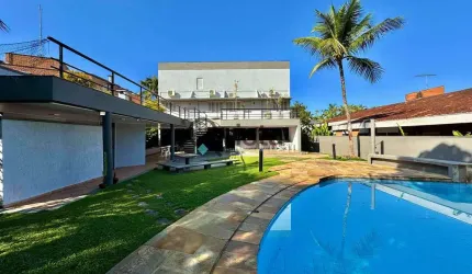 Casa à venda em condomínio fechado na Praia da Enseada, Guarujá, SP | Qvista inteligência Imobiliár
