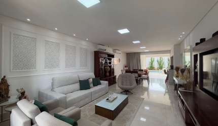 Casa à venda no condomínio Saint Paul com 4 suítes, 276m² de área construída e 360m² de área total.