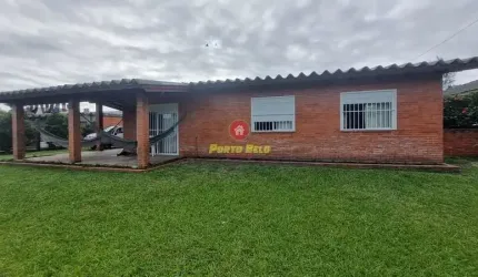 Casa com 4 quartos à venda em Rainha do Mar, Xangri-Lá  por R$ 900.000