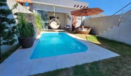 Casa com 4 quartos à venda na Miraguaia, 188, Jardim Beira Mar, Capão da Canoa por R$ 780.000