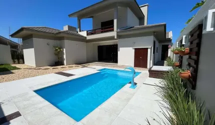 Casa com 4 quartos à venda na Rua Miraguaia, 505, Atlântida, Xangri-Lá, 270 m2 por R$ 1.980.000