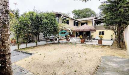 Casa margens do rio Guaraguaçu