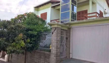 Casa em condomínio fechado com 4 quartos à venda na Jacarandá, 672, São José, Sapucaia do Sul por R$ 1.200.000