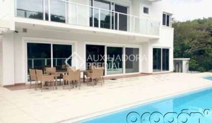 Casa com 6 quartos para alugar na Rua das Tibiras, 614, Jurerê Internacional, Florianópolis, 880 m2 por R$ 40.000