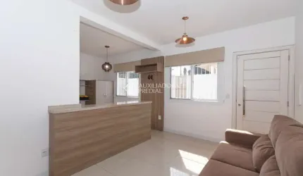 Casa em condomínio fechado com 2 quartos para alugar na Rua Tamoio, 3071, Niterói, Canoas, 102 m2 por R$ 3.000