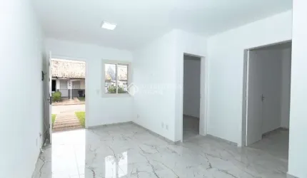 Casa em condomínio fechado com 2 quartos para alugar na Rua Brigadeiro Ivo Borges, 1000, São Luis, Canoas, 61 m2 por R$ 1.600
