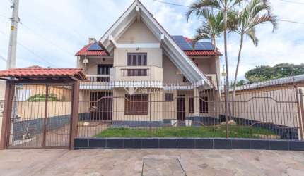 Casa com 5 quartos para alugar na Rua Machado de Assis, 48, Harmonia, Canoas, 176 m2 por R$ 3.500