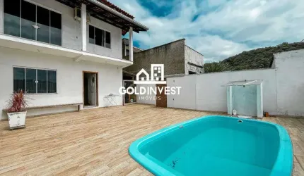 Casa espaçosa com 4 dormitórios, piscina e área de festas no Cedrinho