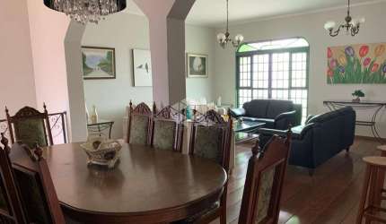vende casa  bairro Independência  4  dormitorios , 4 suites - 4 bairros