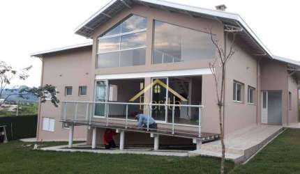 Sobrado com 4 dormitórios à venda, 300 m² por R$ 1.500.000,00 - Condomínio Village da Serra - Tremembé/SP