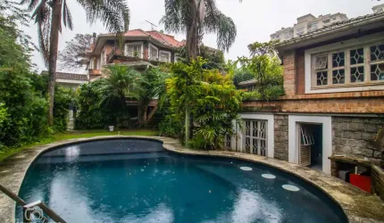 Casa em condomínio fechado com 6 quartos para alugar na Avenida Luiz Manoel Gonzaga, 506, Três Figueiras, Porto Alegre por R$ 29.000