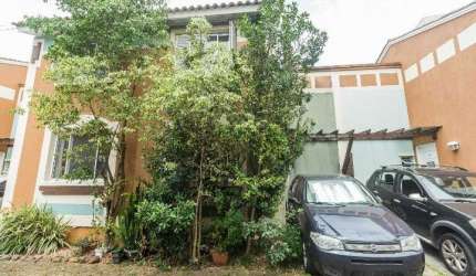 Casa em condomínio fechado com 3 quartos para alugar na Rua Tenente Ary Tarrago, 1720, Jardim Itu Sabará, Porto Alegre por R$ 2.500