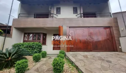 Página 1 Imóveis anuncia belíssimo sobrado com 04 dormitórios sendo 01 suíte com hidromassagem, closet e sacada no bairro Moinhos de Vento em Canoas/RS - SO109