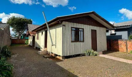 Terreno com 360m² contendo uma casa de madeira à venda, por R$ 250.000 - Primavera - Guarapuava/PR