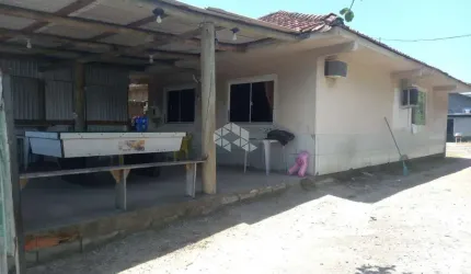 Casa 3 Dormitórios / Quartos  no bairro Barra Aririu - Palhoça a Venda por R$ 336.000,00  .