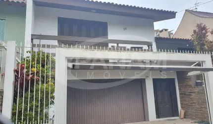 Casa com 4 quartos à venda na Rua Maestro Salvador Campanella, 58, Jardim Itu Sabará, Porto Alegre por R$ 1.025.000