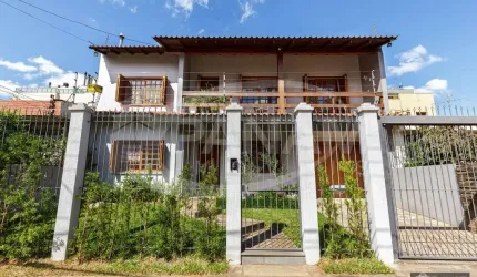 Casa com 3 quartos à venda na Rua Paulo Bento Lobato, 221, Jardim Lindóia, Porto Alegre por R$ 1.090.000
