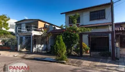 Casa com 3 quartos à venda na Rua Vicente Ferreira Gomes, 496, Sarandi, Porto Alegre por R$ 750.000