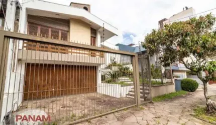 Casa com 3 quartos à venda na Travessa Bermudas, 67, Jardim Lindóia, Porto Alegre por R$ 1.098.000