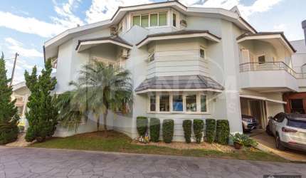 Casa em condomínio fechado com 4 quartos à venda na Avenida Ecoville, 190, Sarandi, Porto Alegre por R$ 1.490.000