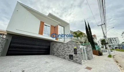 Casa com 3 quartos à venda na Avenida dos Lagos, 31, Pedra Branca, Palhoça por R$ 2.250.000