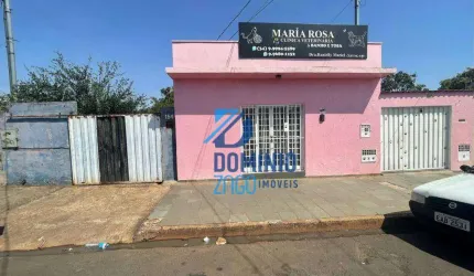 Terreno com aproximadamente 490 m2, com duas casas simples.