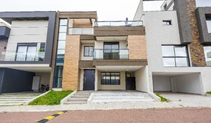 CASA EM CONDOMÍNIO COM 3 SUÍTES E TERRAÇO