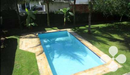 Sobrado com 3 dormitórios à venda, 230 m² por R$ 1.350.000,00 - Acapulco - Guarujá/SP