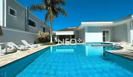 Casa com 7 dormitórios, 628 m² - venda por R$ 6.800.000,00 ou aluguel por R$ 26.900,00/mês - Jardim Acapulco - Guarujá/SP